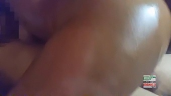 A Young Latina Woman Mounts And Rides A Man'S Penis While Her Boyfriend Masturbates Nearby, Culminating In The Man Ejaculating On The Woman'S Breasts